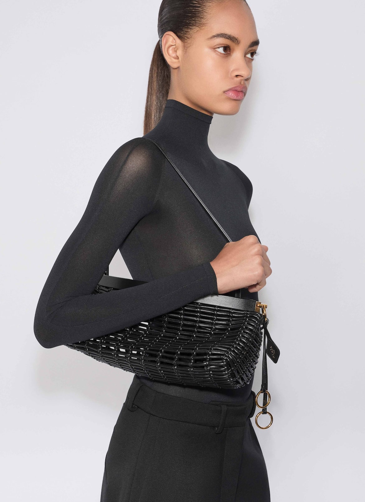 LE CLICK EAST WEST MEDIUM BAG IN BRAIDED CALFSKIN ALAÏA BLACK LE CLICK EAST WEST MEDIUM BAG IN BRAIDED CALFSKIN